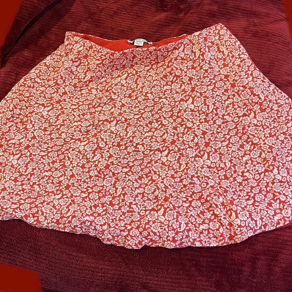 Red skirt with cream flowers; American Eagle, size Medium